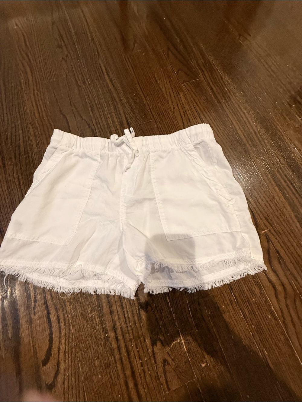 For The Republic White High-Waist Drawstring Fringe Shorts